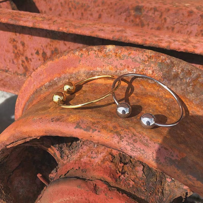 Two Globe Thin Silver Bracelet