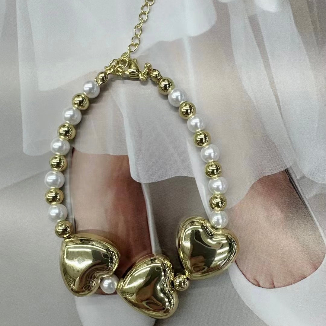 3 Hearts Globes Gold Pearls Bracelet