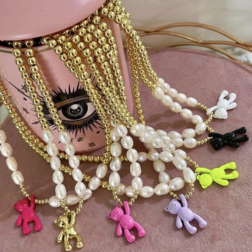 Pearls and Gold Necklace With Fuchsia Teddy