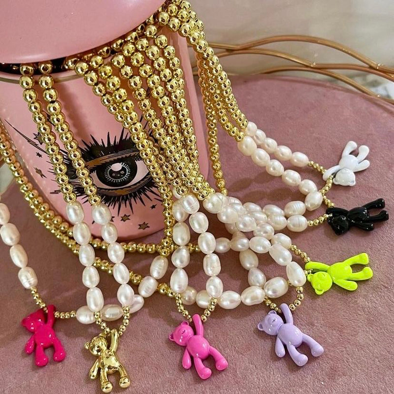 Pearls and Gold Necklace With Fuchsia Teddy