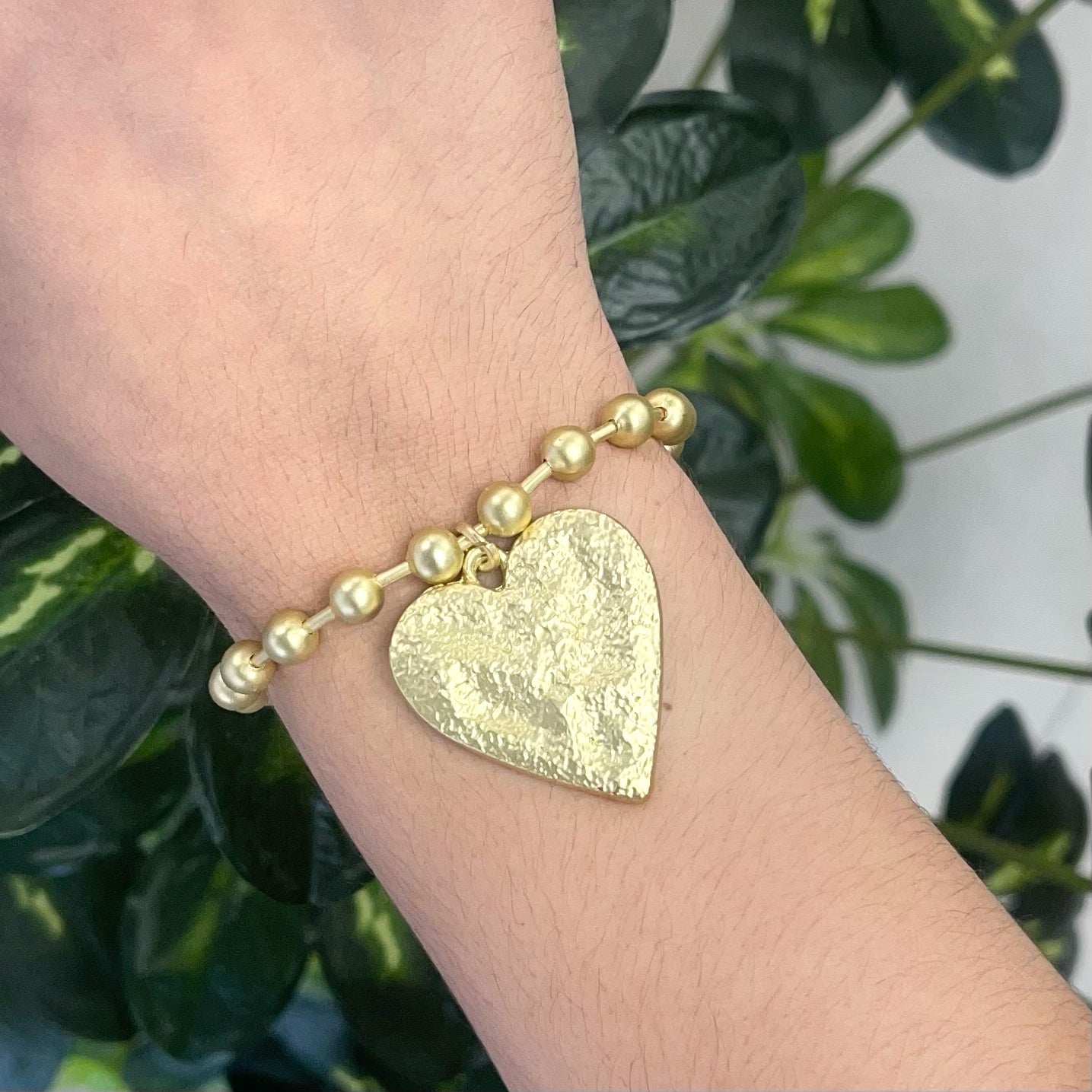 Snowball hanging heart gold bracelet