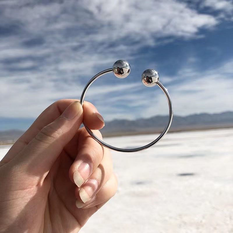 Two Globe Thin Silver Bracelet