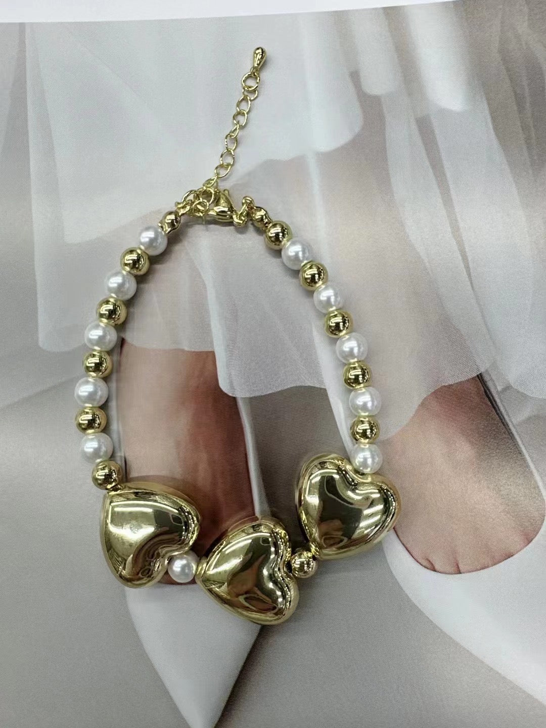 3 Hearts Globes Gold Pearls Bracelet