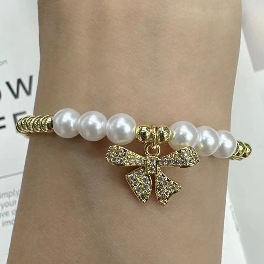 Quartz Bow With Pearls Gold Bracelet