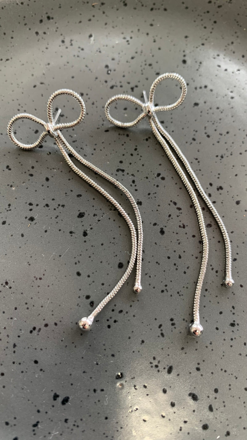 Long Bow Silver Earrings