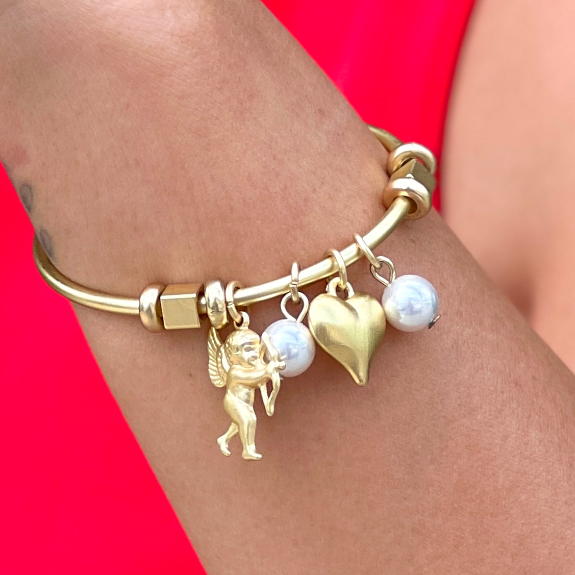 Open Gold Bracelet with Pearls, Heart and Cupid