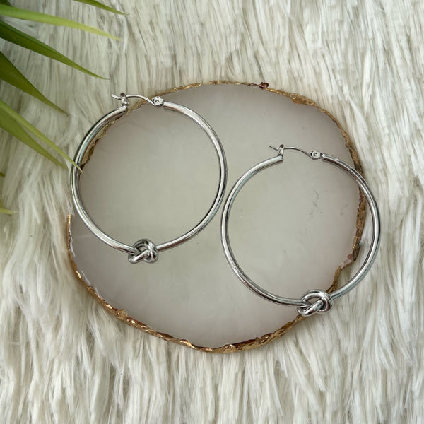 Silver hoops earrings with knot