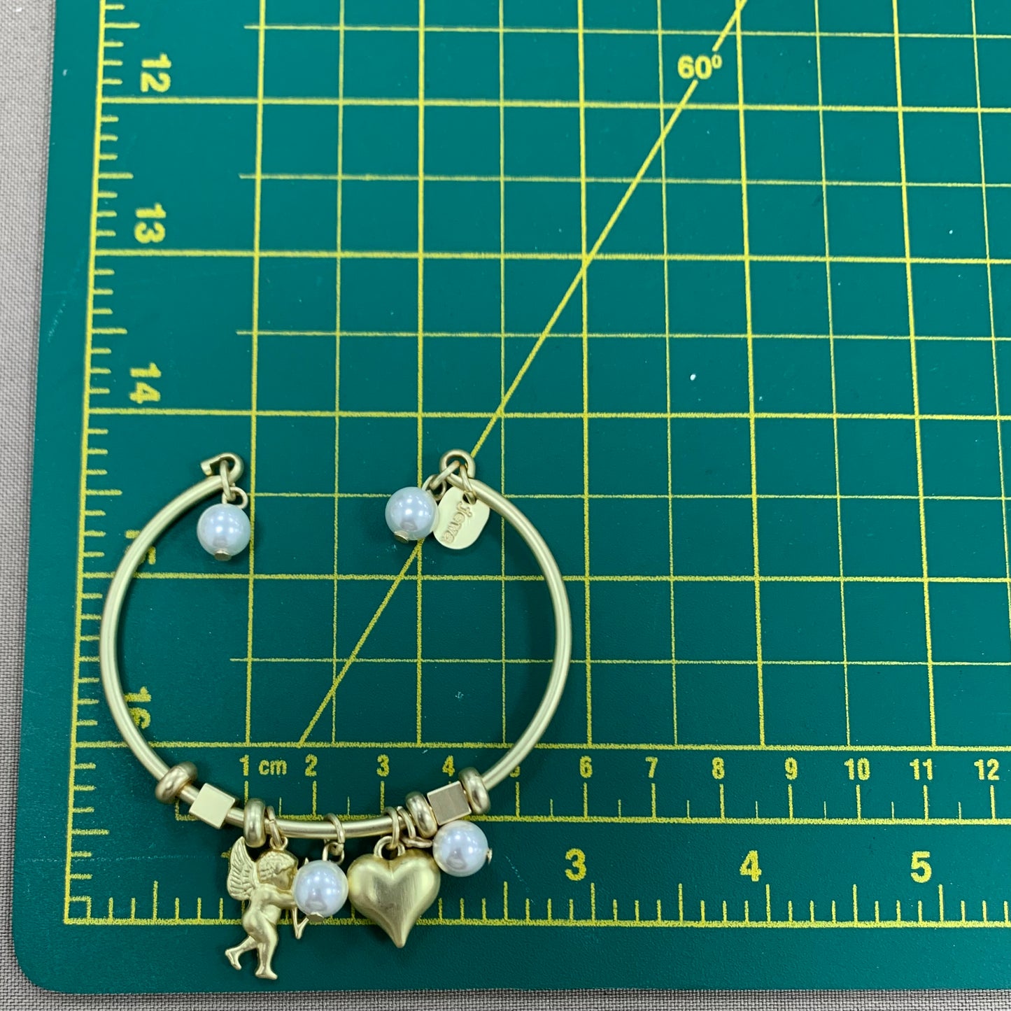 Open Gold Bracelet with Pearls, Heart and Cupid